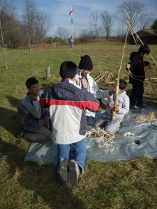 Helping teach knots and pioneering
